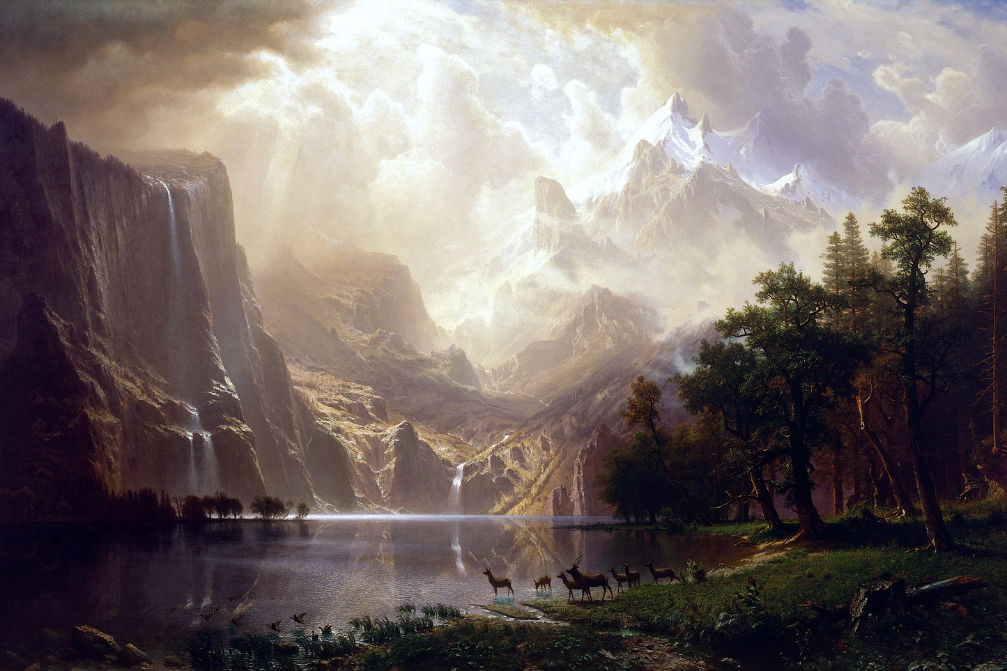 Majestic mountain landscape with a lake and animals, featuring a prominent waterfall.